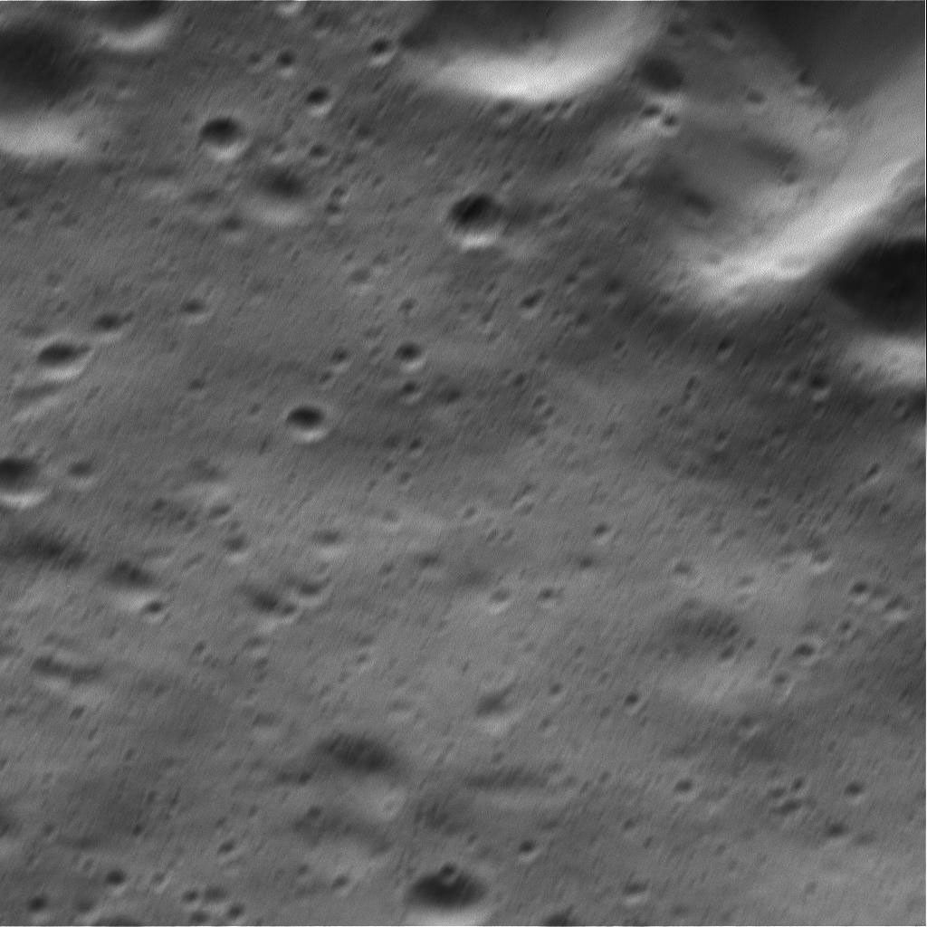 This two-in-one view of Dione from NASA's Cassini spacecraft includes the mission's highest-resolution view of the Saturnian moon's icy surface.