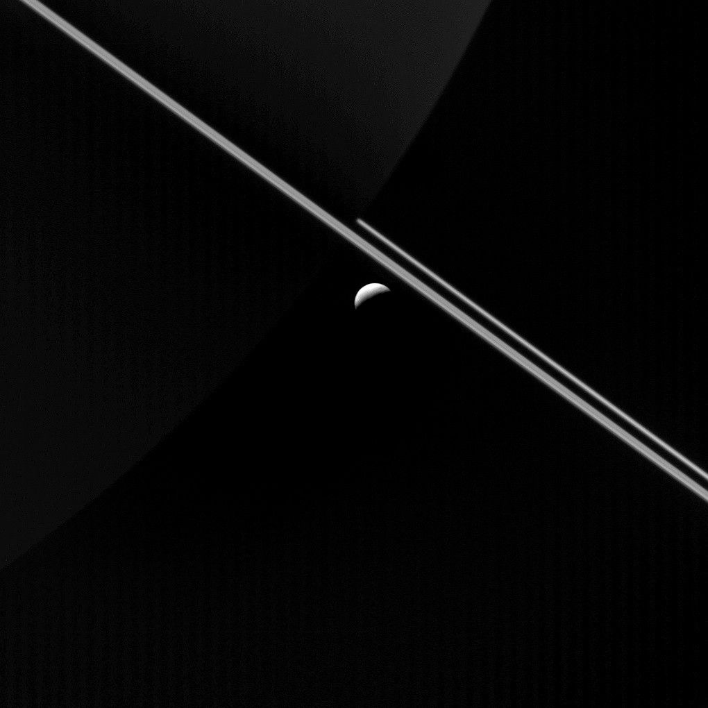 Saturn's night side, Saturn's rings and the icy moon Enceladus