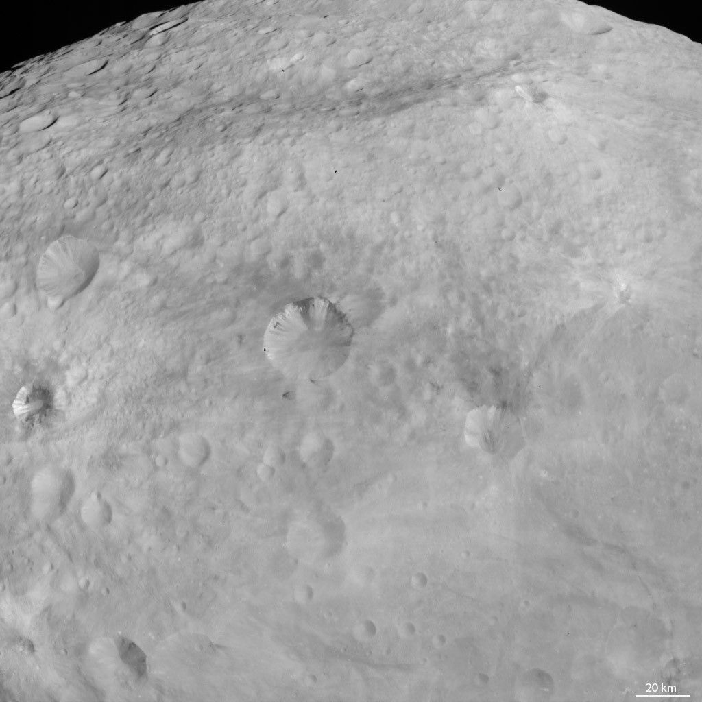 Dark Patches and Stripes on Crater Walls