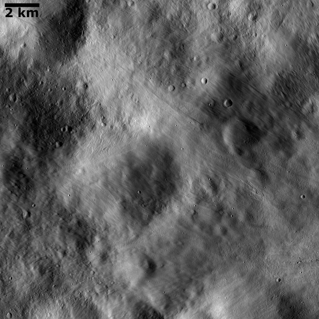 Impact Ejecta Deposits Covering Underlying Topography