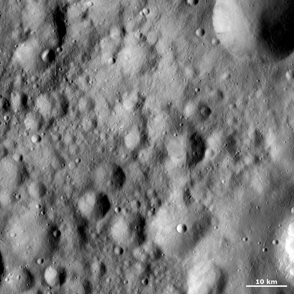 Fresh Crater Inside a Rectangular Crater