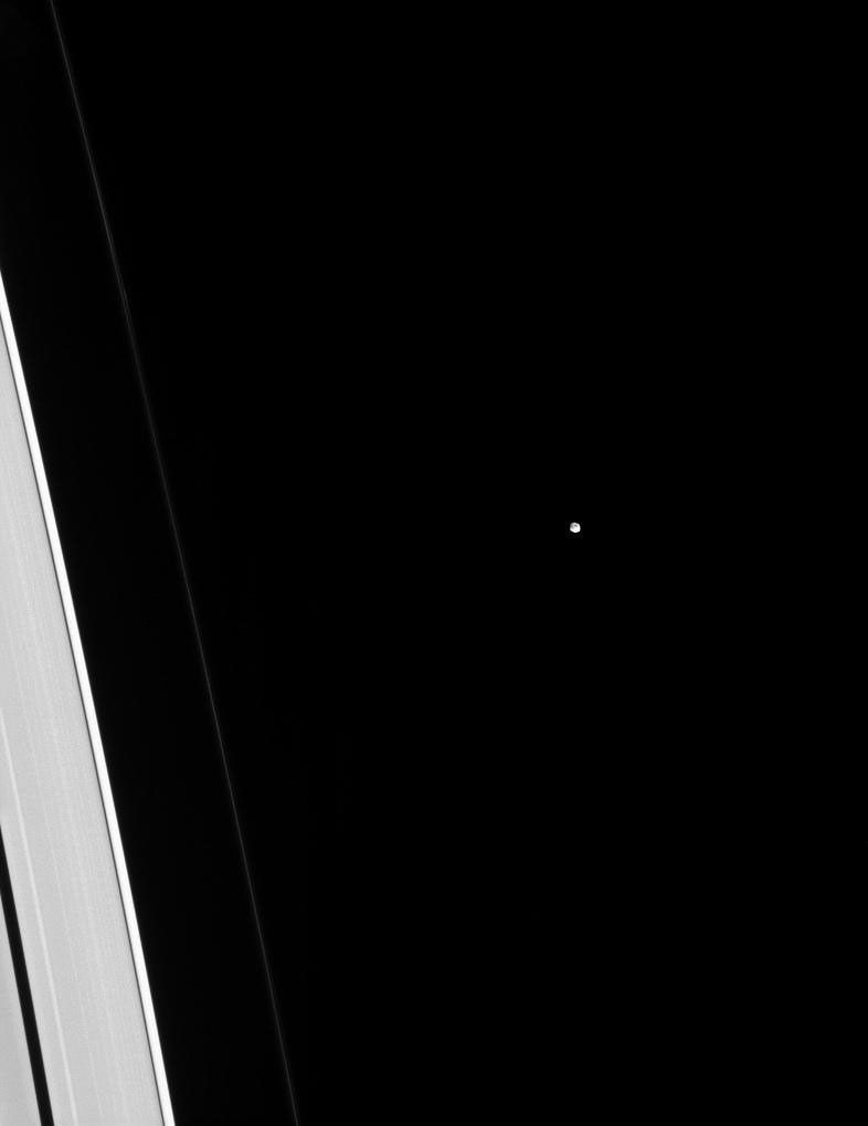 Tiny Epimetheus is dwarfed by adjacent slivers of the A and F rings