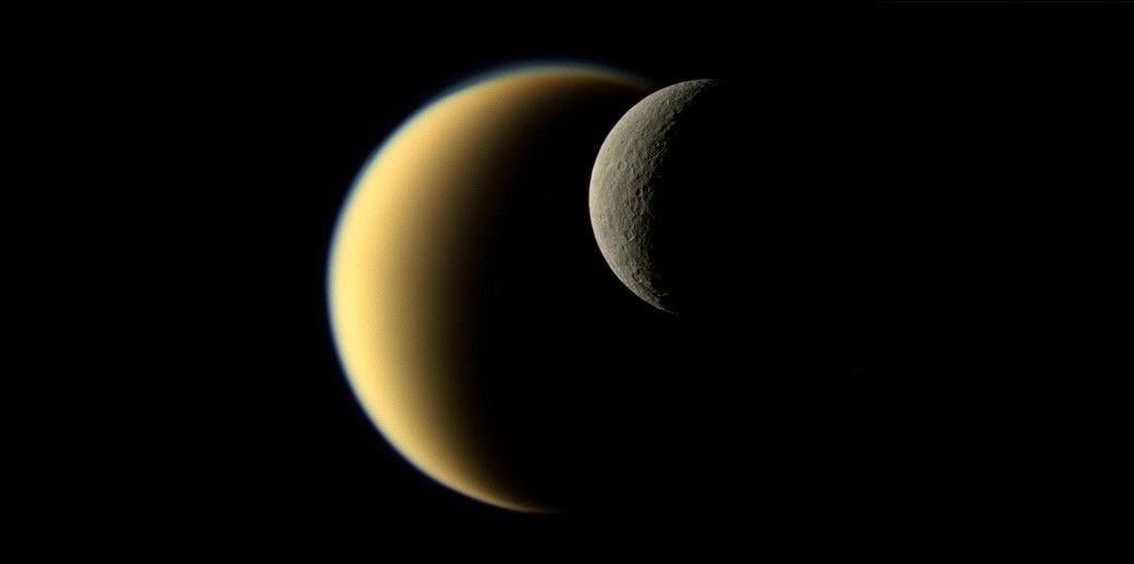 Two crescent moons overlapping in space.