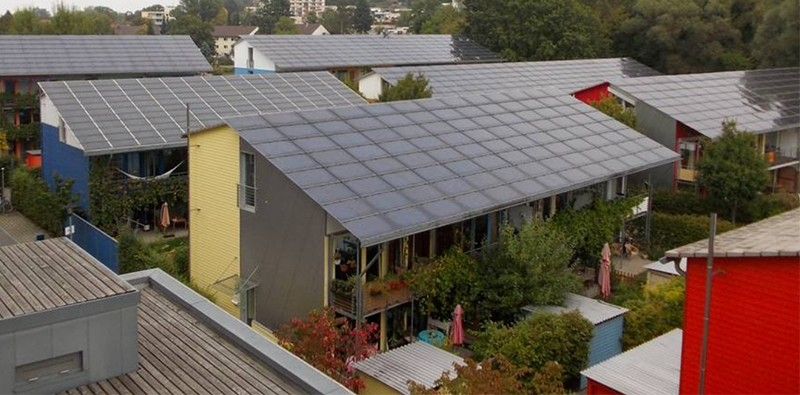 Image of two cardboard box solar homes.