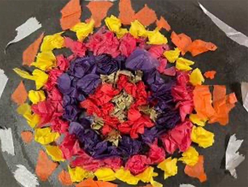 a colorful set of concentric circles made of craft paper