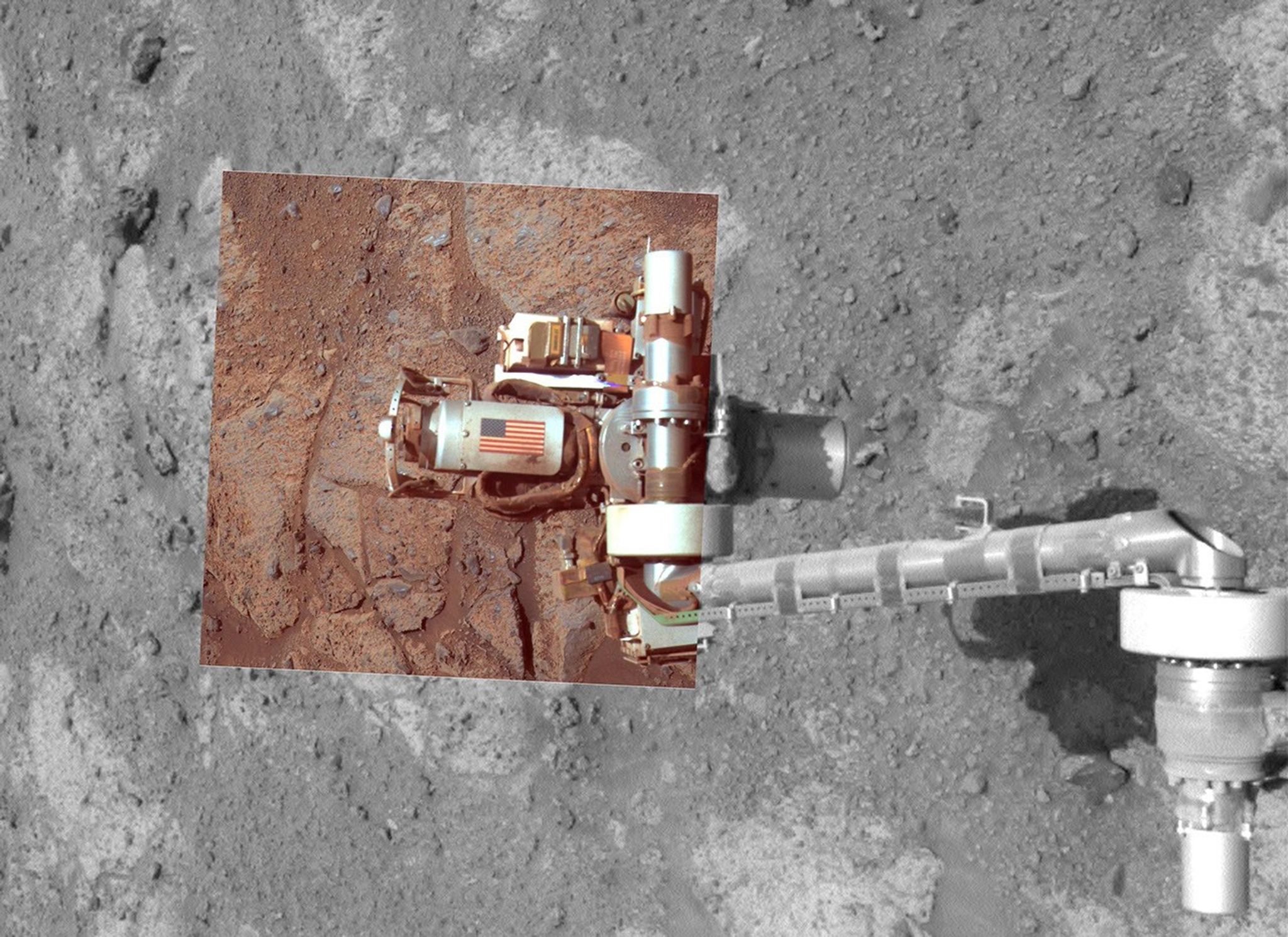 robotic arm with tool imprinted with u.s. flag