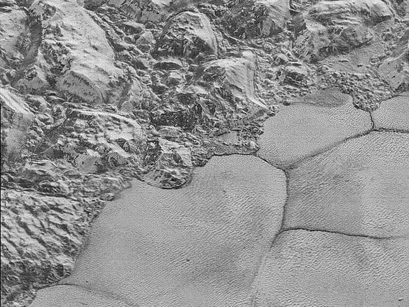Close up of mountains and plains on Pluto.