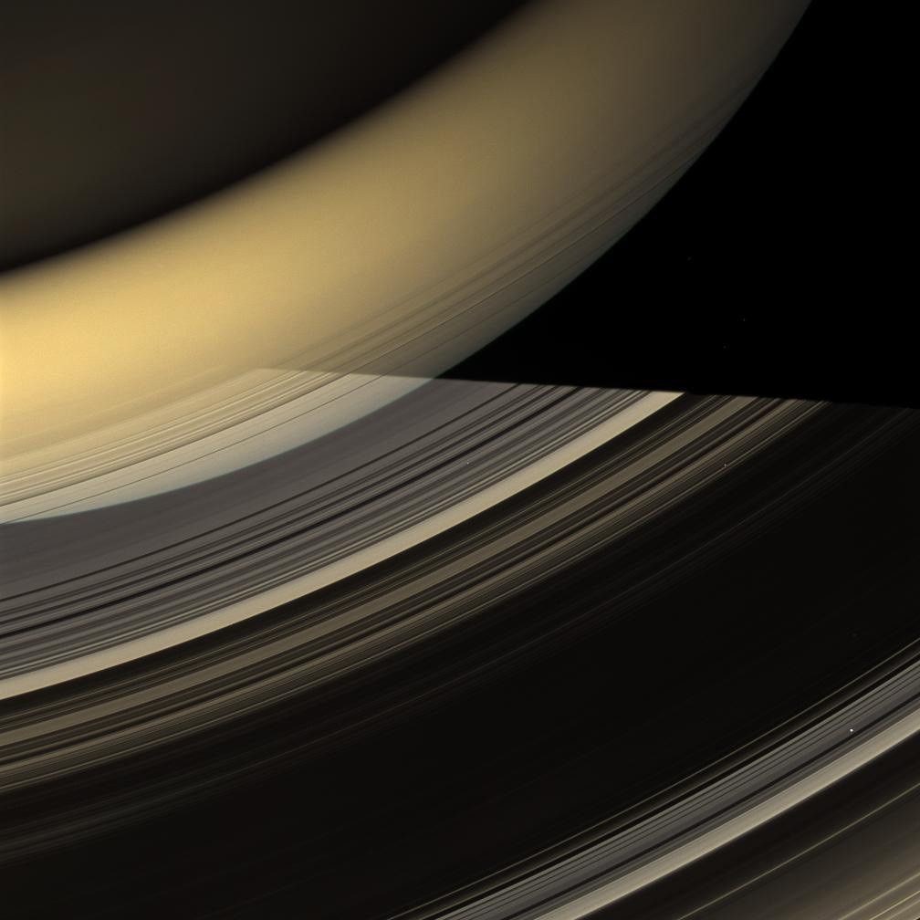 Saturn's rings crossed by shadow.