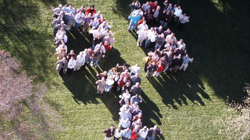 Group of people spelling out DS1