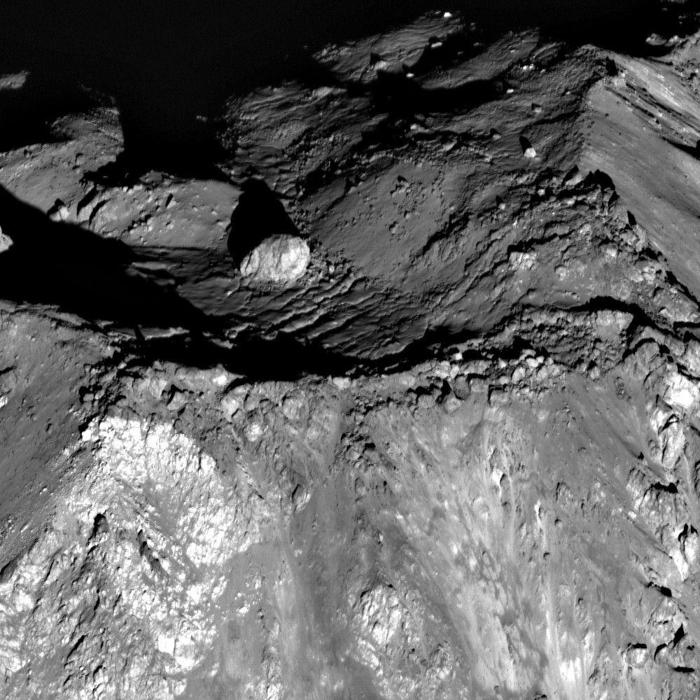 Boulder on peak on the Moon.