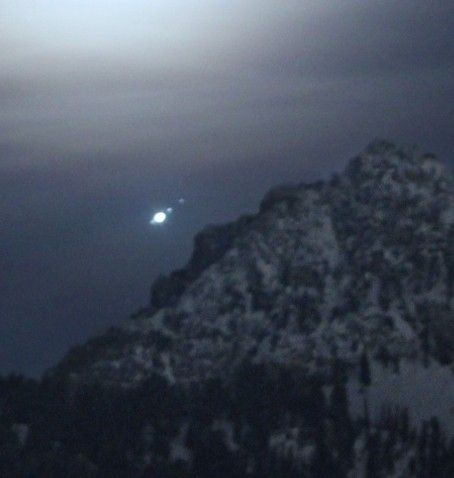 Jupiter's moons and mountainside