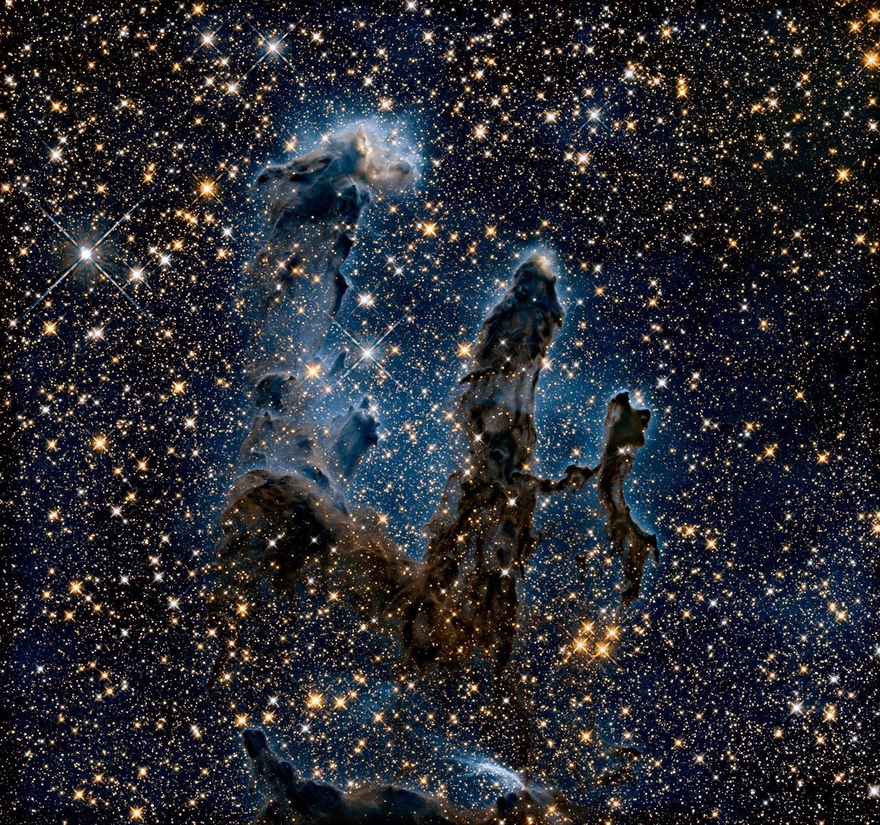Star-filled view with faint outlines of gas clouds.
