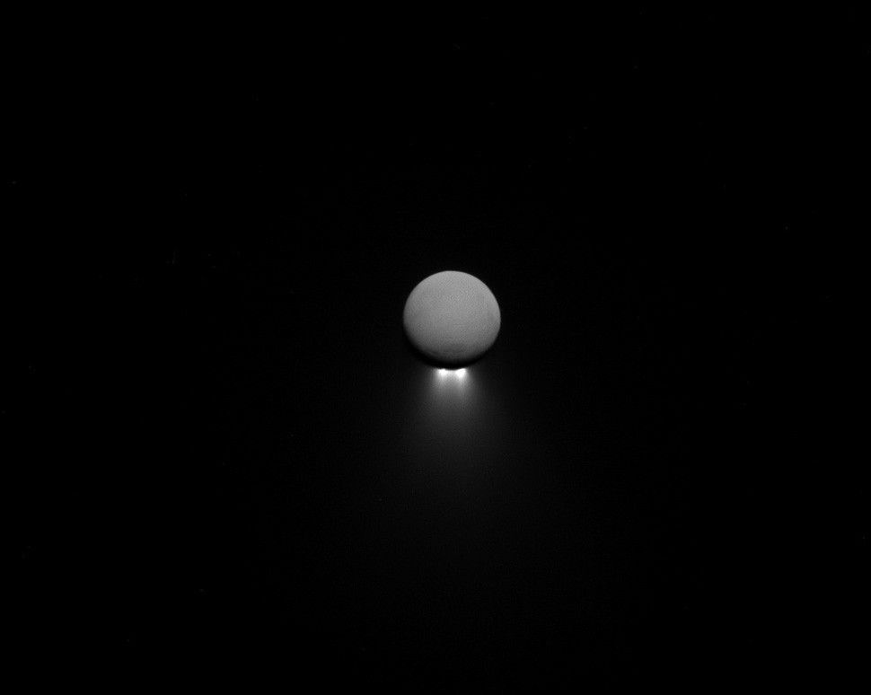 moon against dark background of space with brightly illuminated jets of material