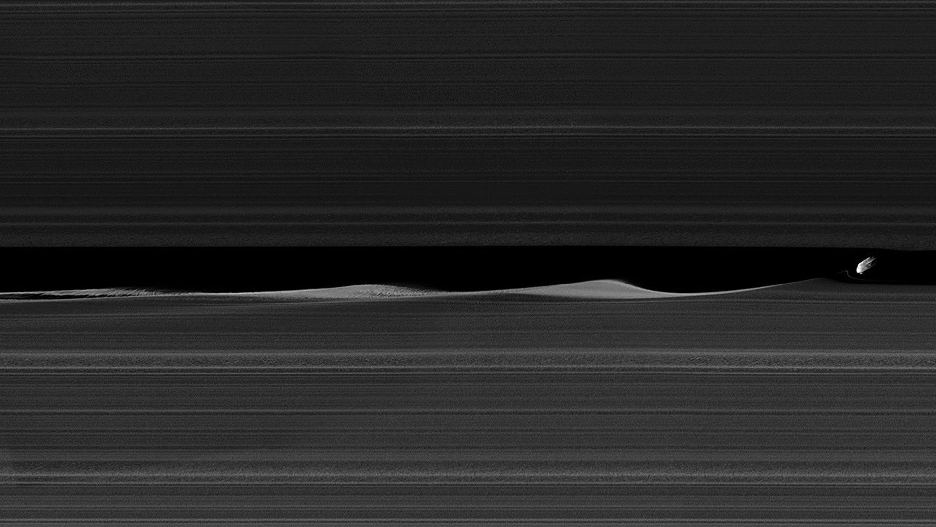 moonlet making waves in ring material