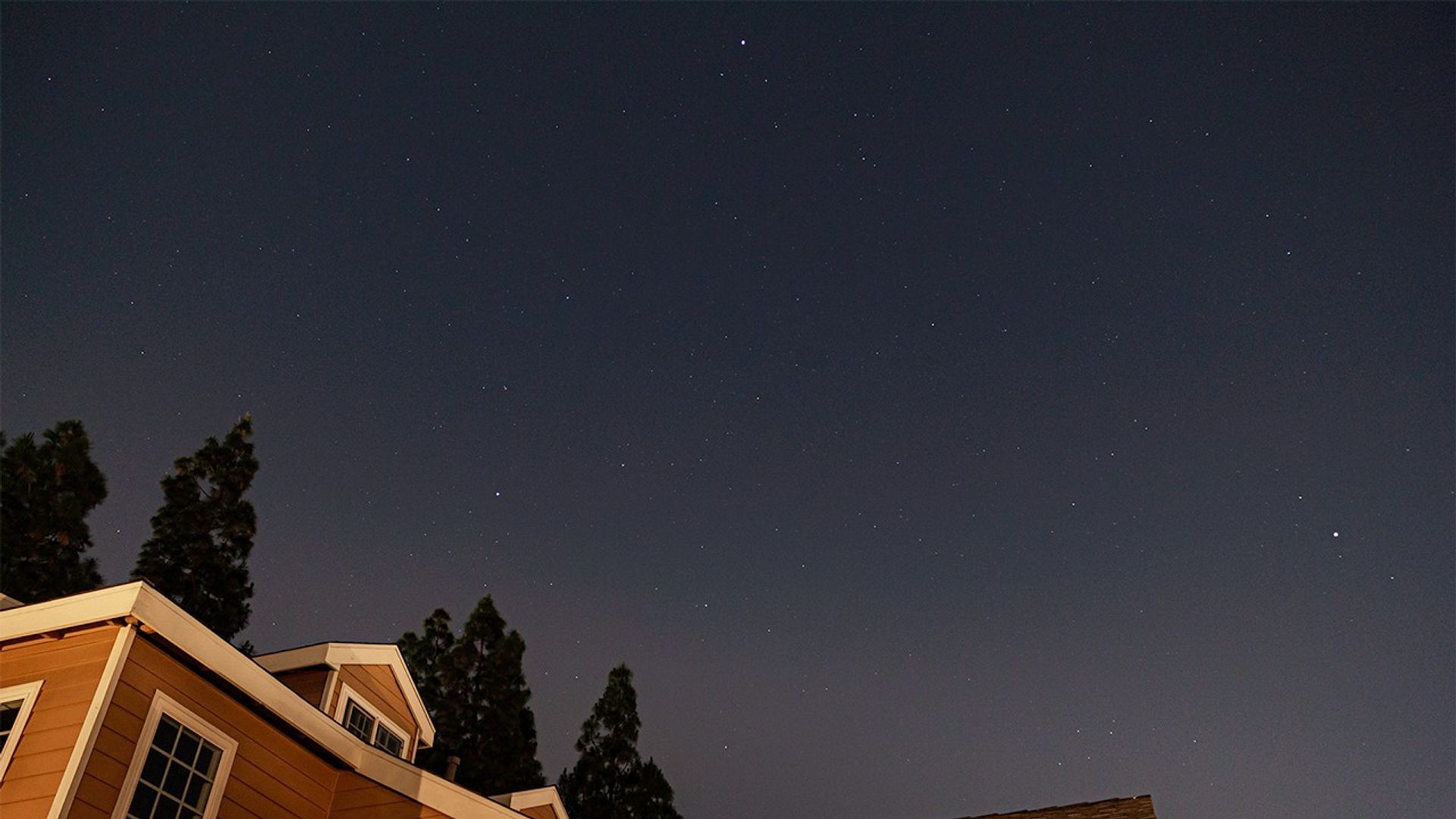 Night sky photo of the Summer Triangle with stars labeled.
