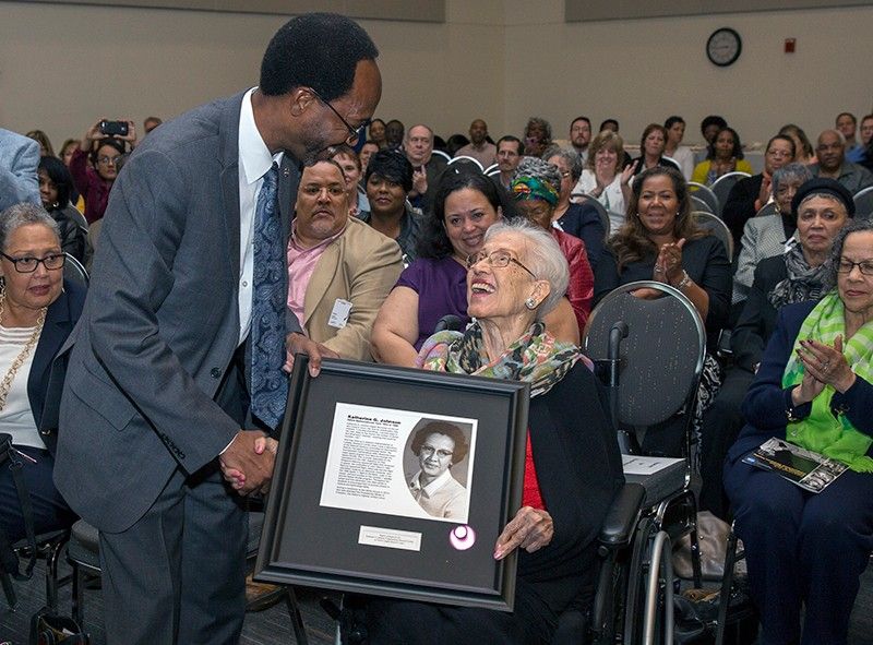 Katherine Johnson receiving a plaque