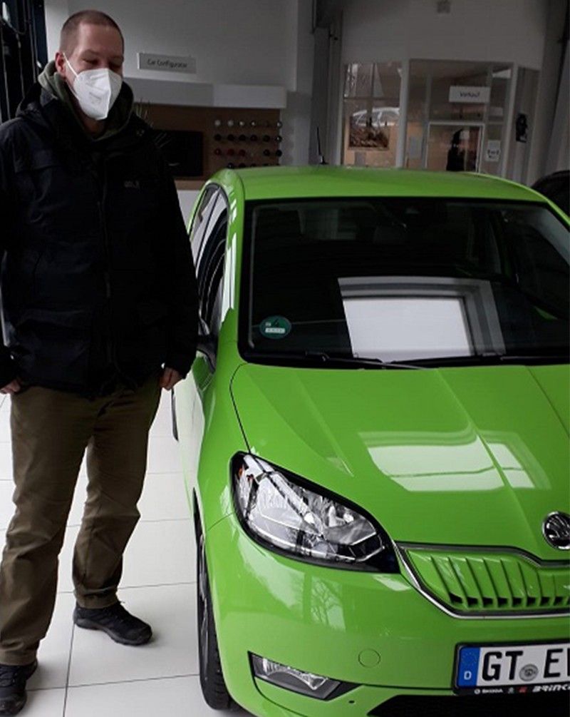 Timo with his electric car