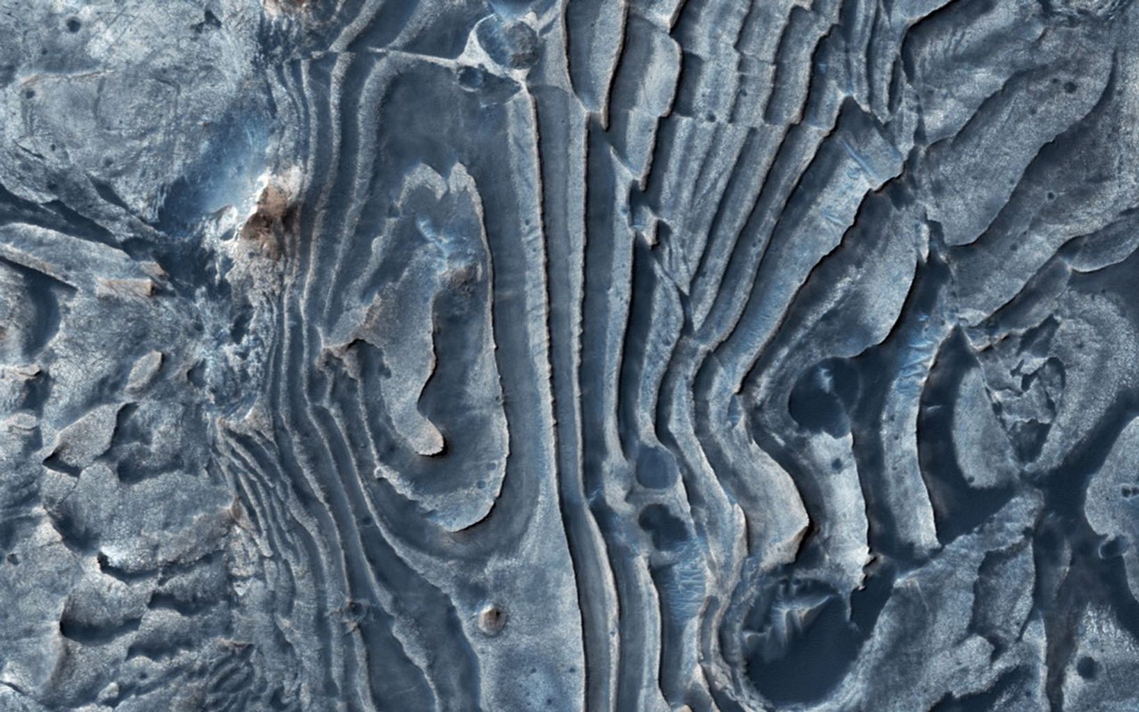 layered rock interrupted by a fault line