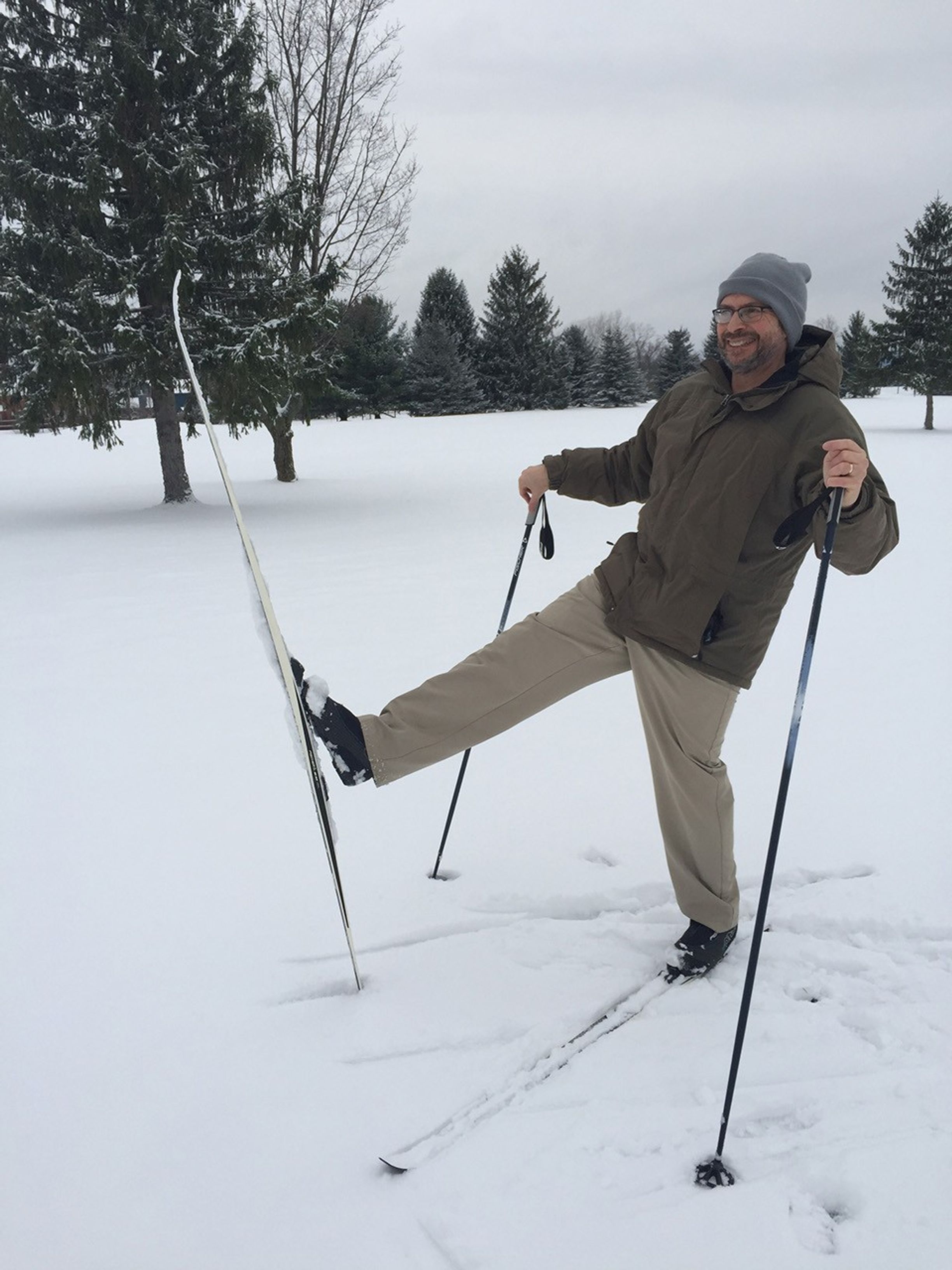Color image of man on skis in snow.