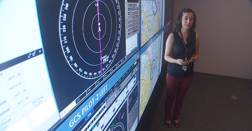 Rania Ghatas in front of a screen