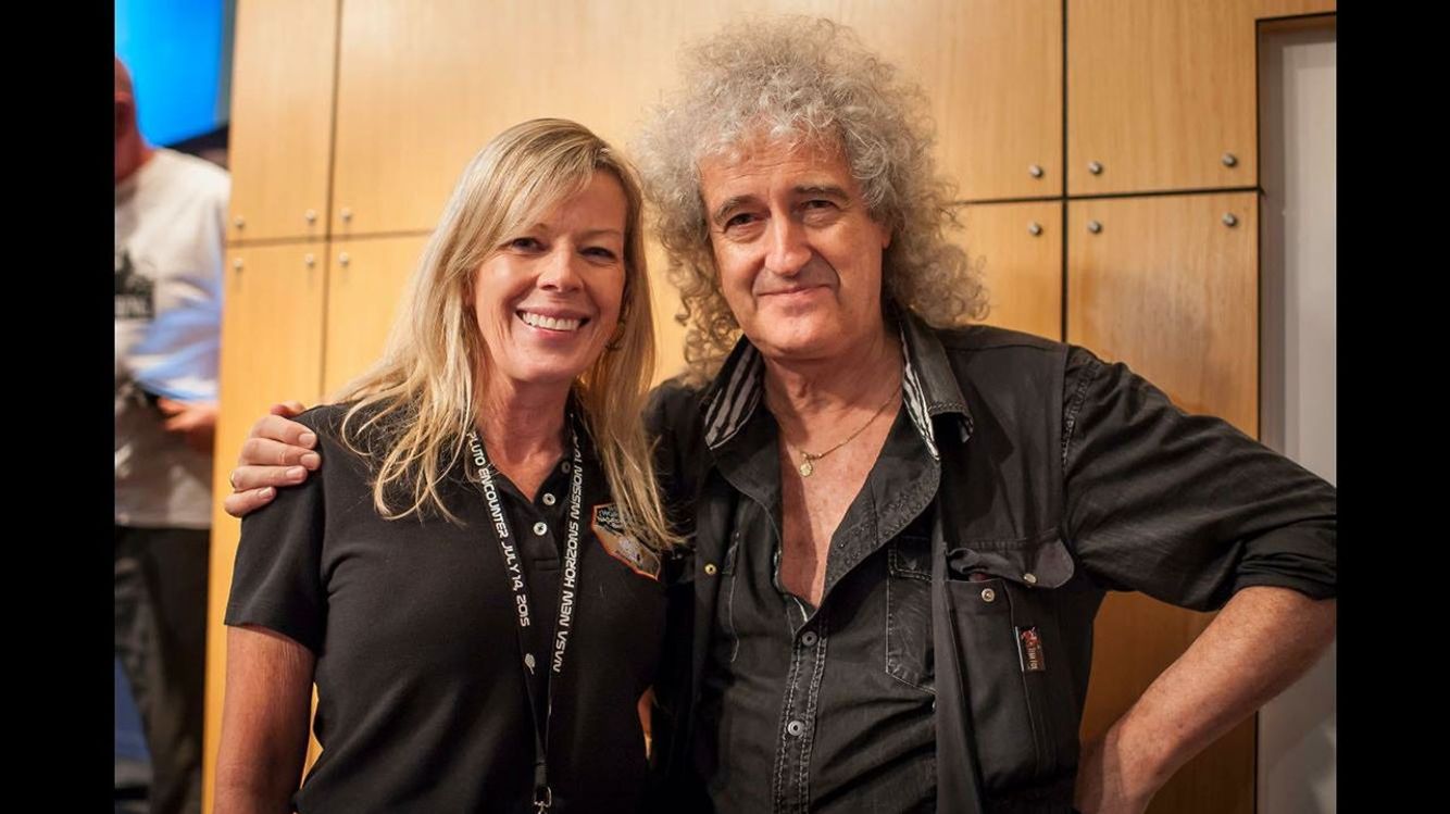 With Queen guitarist and astrophysicist Brian May at Pluto flyby